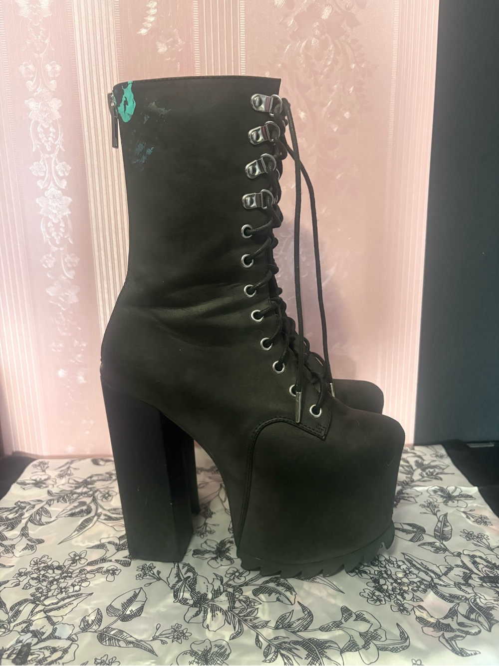 Lace up high heeled boot